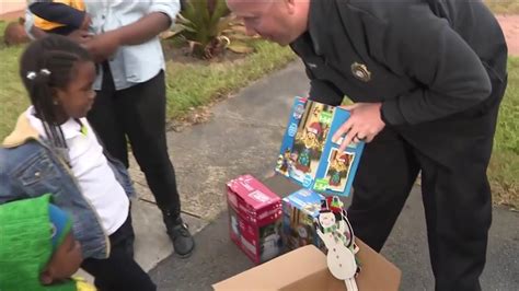 Lauderhill firefighters bring Christmas joy to 4 local families